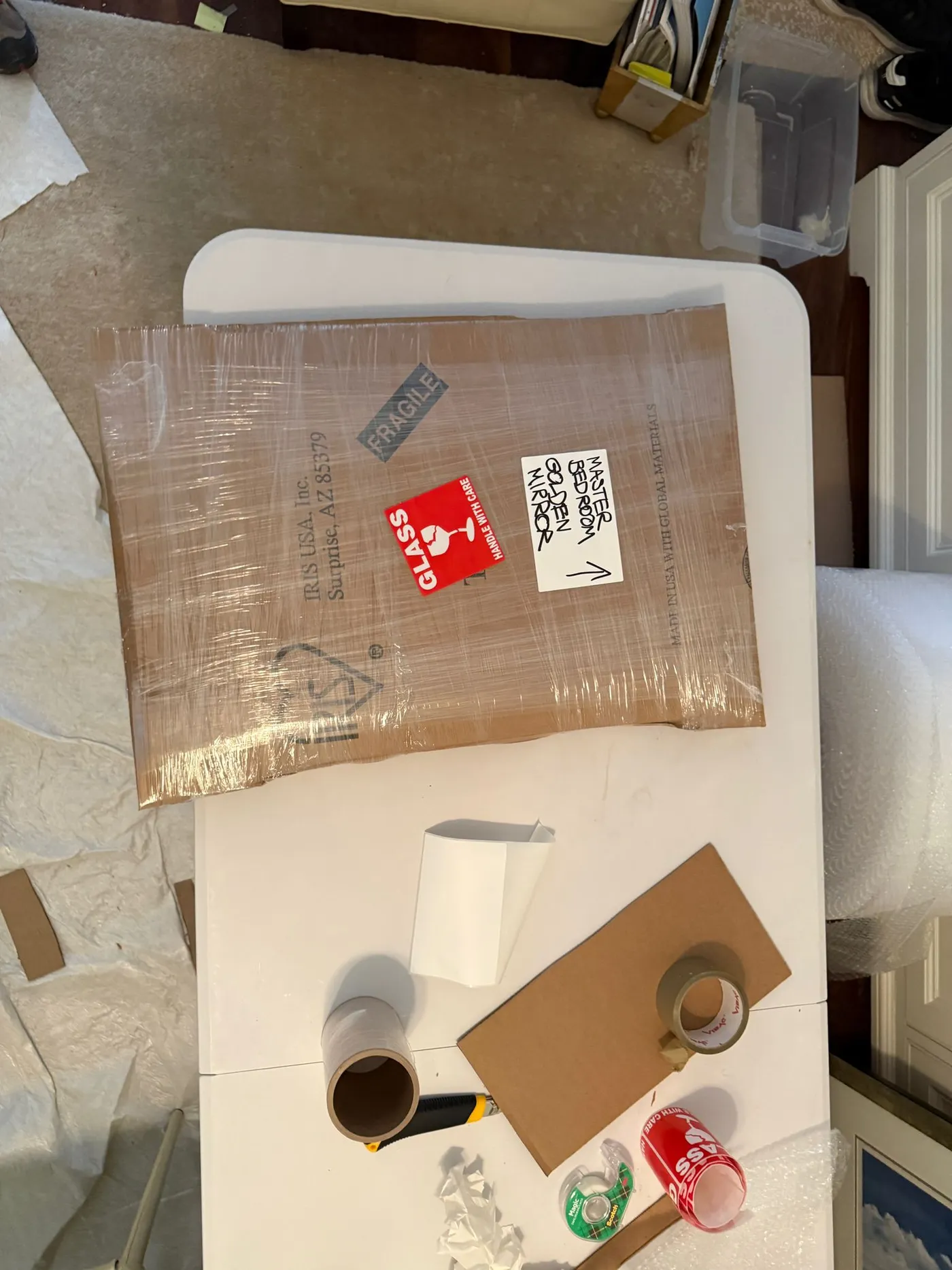 Securely wrapped flat item ready for safe transport